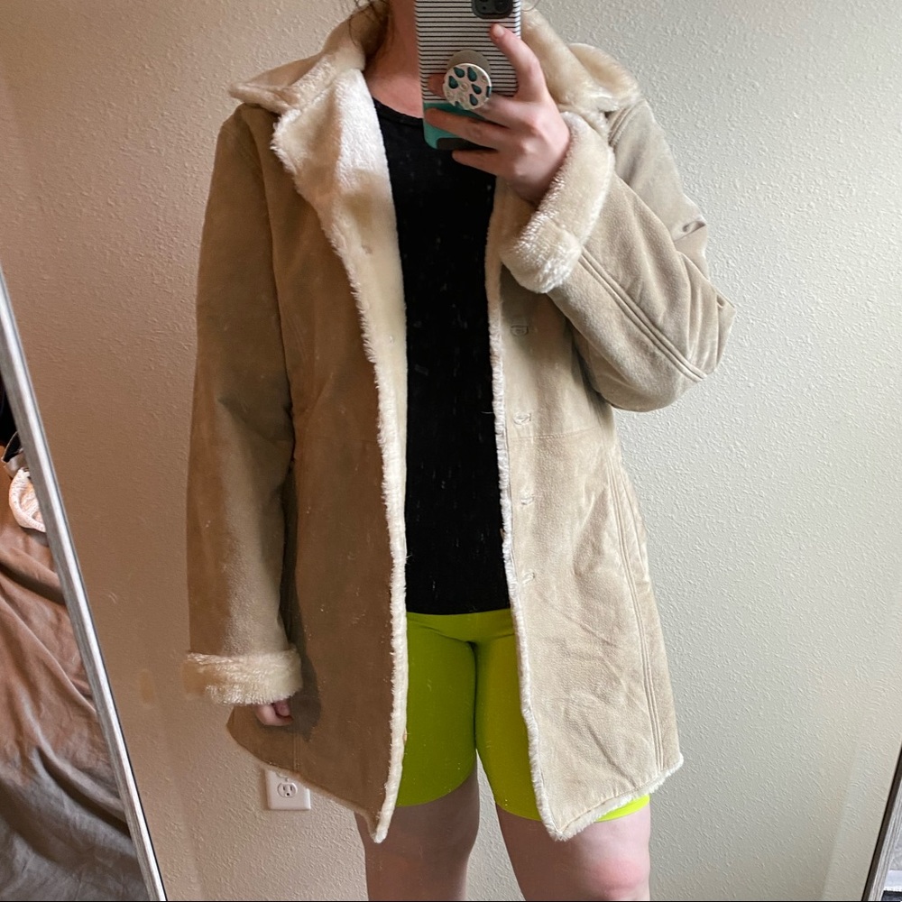 Thick tan leather coat